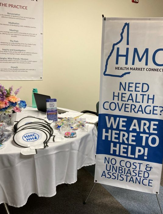 health market connect nh table at an event
